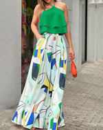 Two Piece Sleeveless Halter Neck Solid Top and Pocketed Printed Maxi Skirt